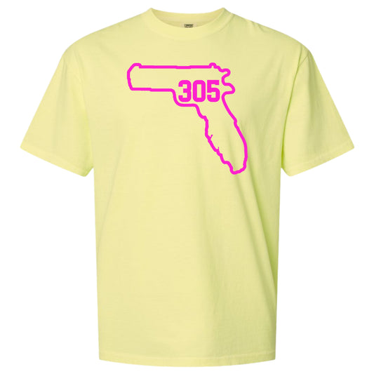 A Neon Lemon yellow short-sleeve crewneck t-shirt featuring a bright pink outline of a handgun shaped like the state of Florida, with Miami area code '305' printed in pink inside the graphic.