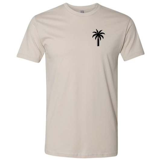A sand-colored modern fit T-shirt with a small black palm tree and bullet graphic on the front chest.