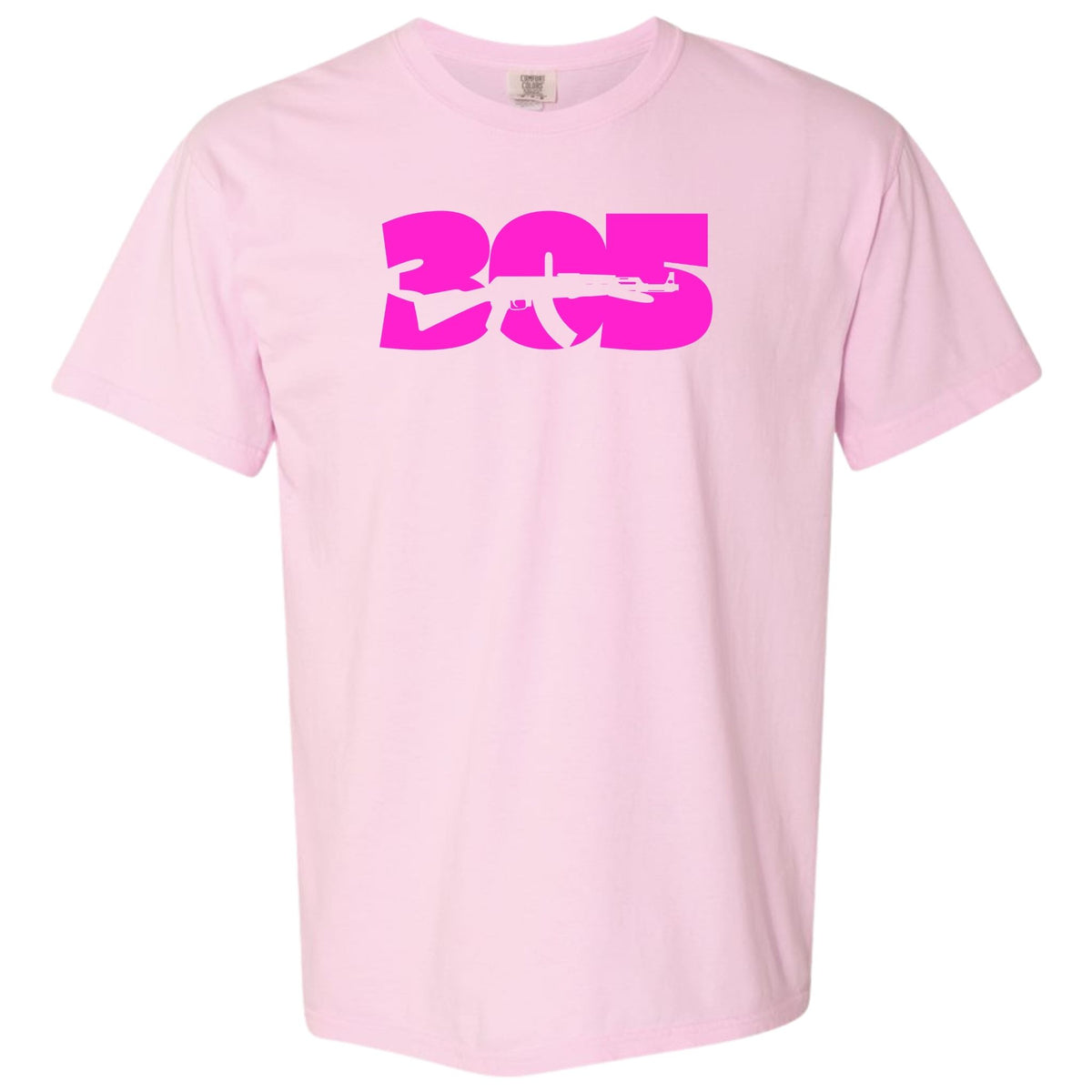 A blossom pink short-sleeve crewneck t-shirt featuring a large hot pink graphic on the chest that reads '305' Miami area code with a rifle silhouette integrated into the design, shown against a plain white background.