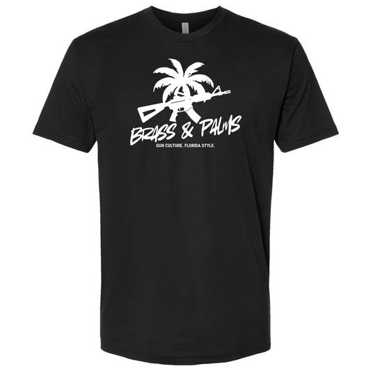 A black short-sleeve crewneck t-shirt with a black graphic on the chest featuring a palm tree, rifle, and the text 'BRASS & PALMS' and 'GUN CULTURE, FLORIDA STYLE.'.