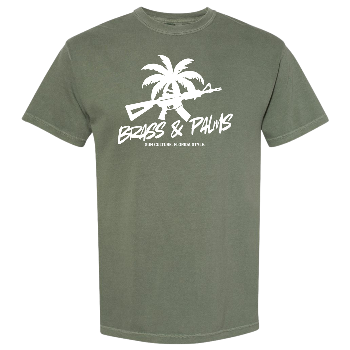 An olive green Moss short-sleeve t-shirt with a white graphic on the chest featuring a palm tree, a rifle, and the text 'BRASS & PALMS' and 'GUN CULTURE. FLORIDA STYLE'.